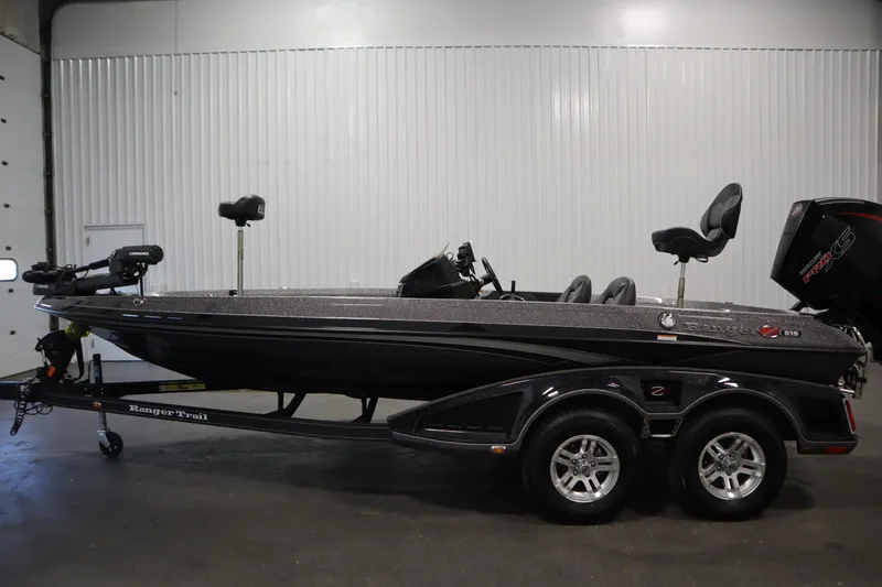 Slide: The Image of 2023 Ranger Z519 boat on trailer in indoor setting. - 8