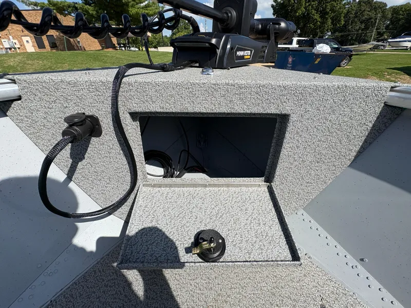 Slide: The Image of 2025 Lund 1875 Alaskan Sport boat interior with Minn Kota trolling motor. - 13