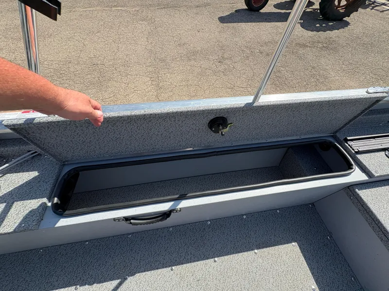 Slide: The Image of Open storage compartment in 2025 Lund 1875 Alaskan Sport boat. - 22