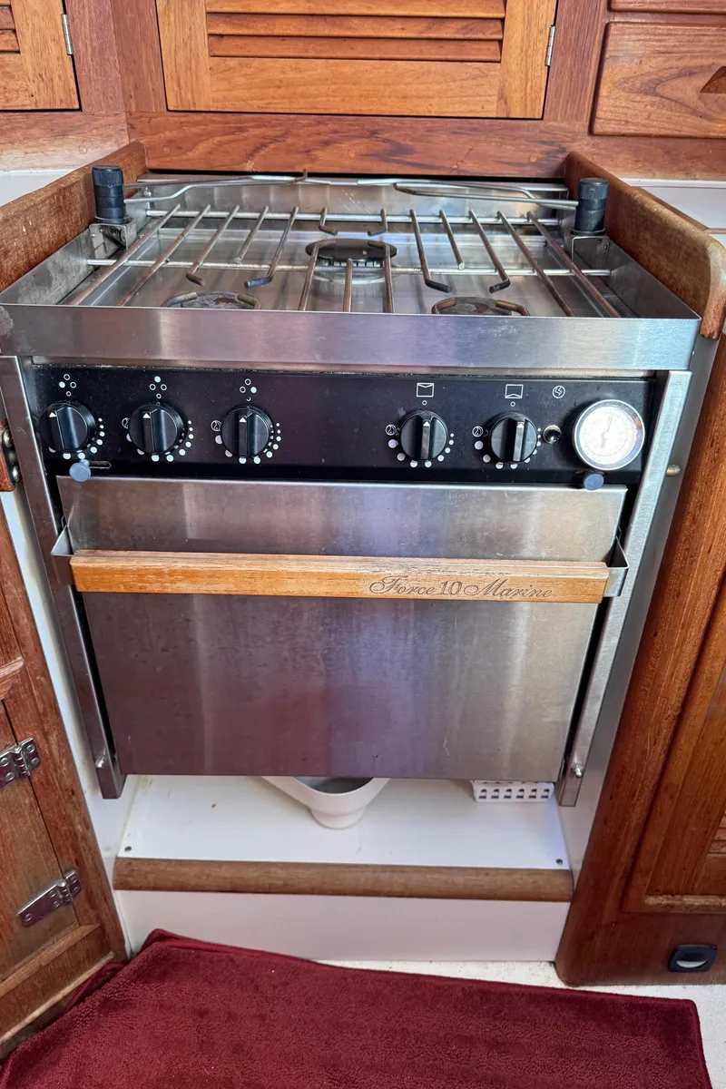 Slide: The Image of Stainless steel marine stove and oven in a Tartan 3500 yacht kitchen, 1997 model. - 23