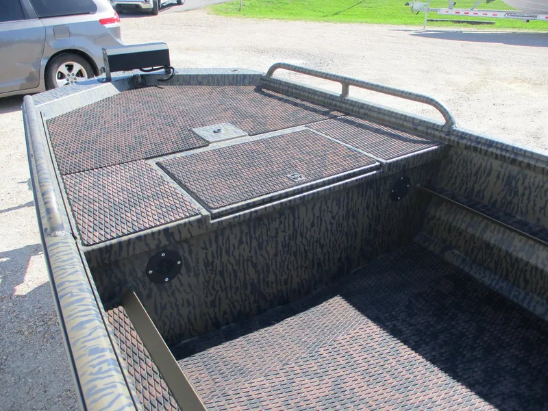 Slide: The Image of 2025 Gator Tail 1750 Savage boat interior with camouflage design and spacious deck. - 10