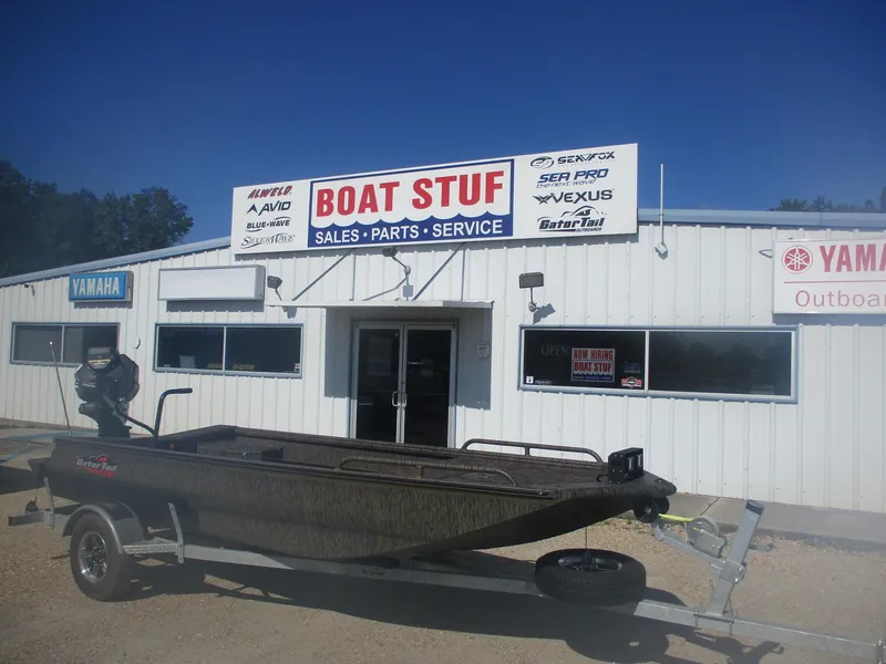 Slide: The Image of 2025 Gator Tail 1750 Savage boat outside Boat Stuf store, offering sales and service. - 4