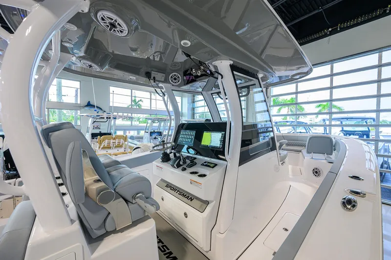 Slide: The Image of 2026 Sportsman Heritage 321 Center Console boat interior with advanced navigation system. - 17