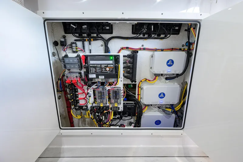Slide: The Image of Electrical panel of 2026 Sportsman Heritage 321 Center Console boat, showcasing wiring and components. - 39