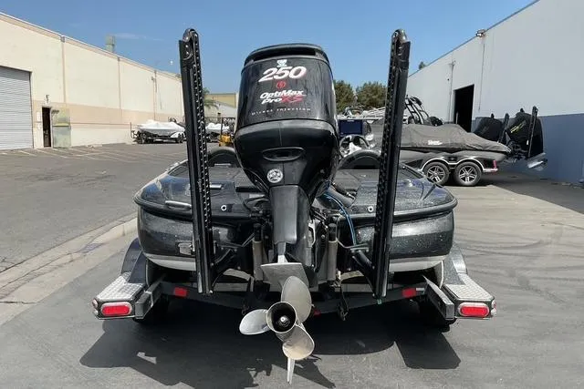 Slide: The Image of 2015 Nitro Z-9 boat with powerful 250 OptiMax Pro XS engine, parked outdoors. - 10