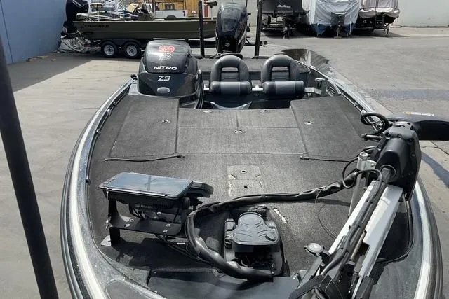 Slide: The Image of 2015 Nitro Z-9 boat with dual seats and advanced fishing equipment. - 16