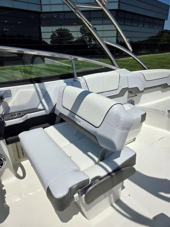 Slide: The Image of 2016 Formula 290 Bowrider interior with white seating and modern design. - 13