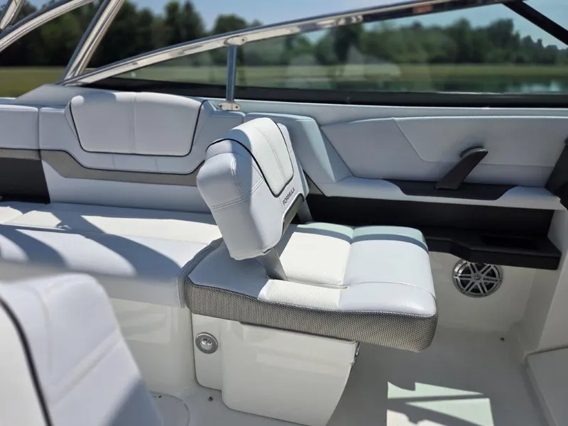 Slide: The Image of 2016 Formula 290 Bowrider interior with white seating and sleek design. - 15