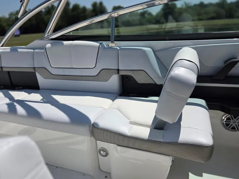 Slide: The Image of 2016 Formula 290 Bowrider interior with luxurious white seating and sleek design. - 16