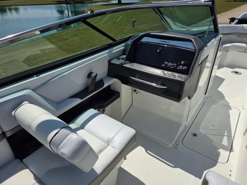 Slide: The Image of 2016 Formula 290 Bowrider interior with sleek seating and modern dashboard design. - 17