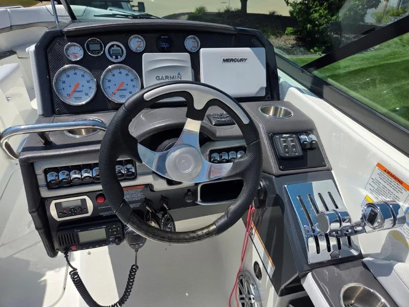 Slide: The Image of 2016 Formula 290 Bowrider dashboard with steering wheel, gauges, and controls. - 18