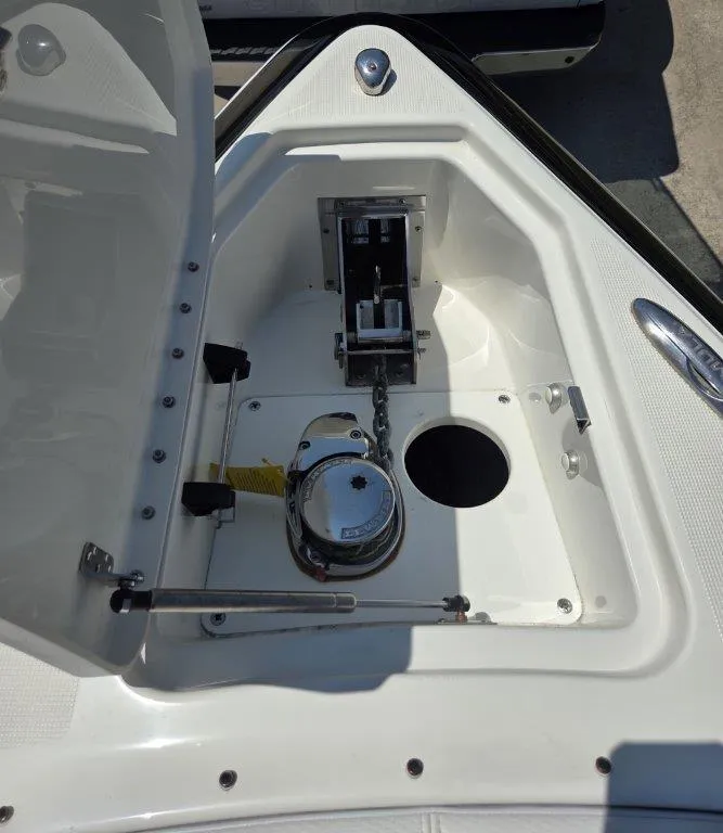 Slide: The Image of 2016 Formula 290 Bowrider anchor compartment with chain and winch system. - 8