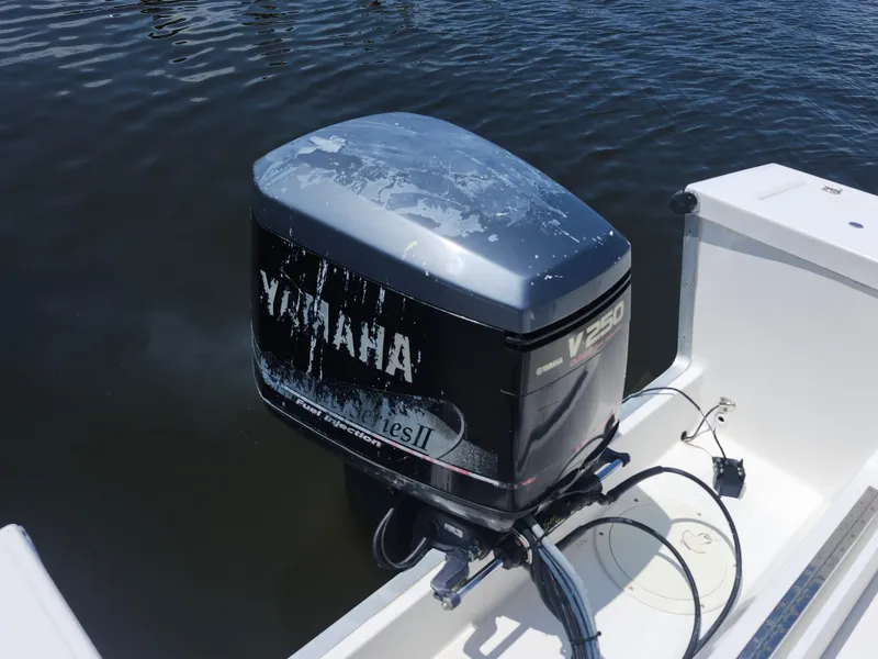 Slide: The Image of Yamaha V250 outboard motor on a 2002 Regulator 23 Classic boat. - 23