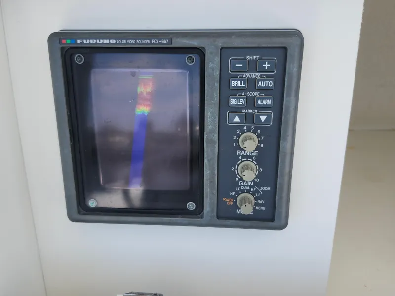 Slide: The Image of Furuno FCV-667 color video sounder on 2002 Regulator 23 Classic boat. - 26