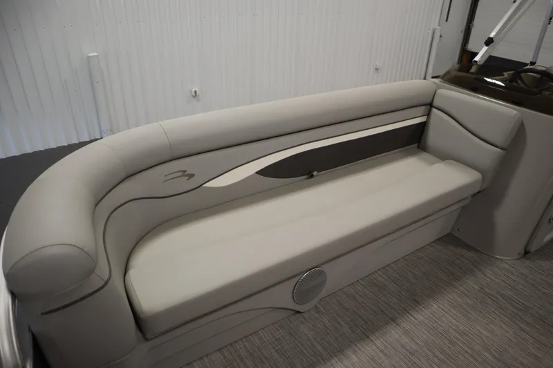 Slide: The Image of 2020 Bennington 16 SL boat interior with sleek, gray seating and modern design. - 14