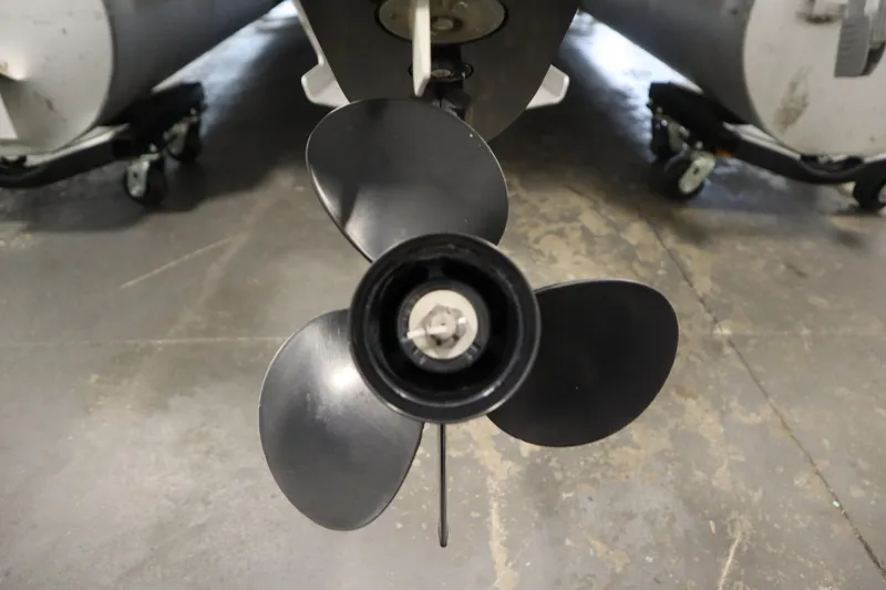 Slide: The Image of Close-up of a 2020 Bennington 16 SL boat propeller on a concrete floor. - 39