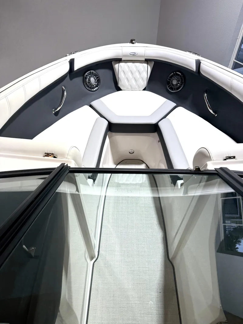 Slide: The Image of Interior view of a 2025 Regal 2000 ES boat, featuring sleek seating and modern design. - 7