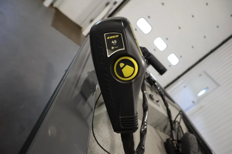 Slide: The Image of Close-up of a 2017 Tracker 20 CW Pontoon boat control panel indoors. - 11