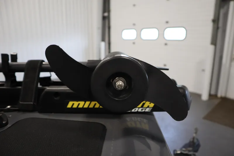 Slide: The Image of Close-up of a 2017 Tracker 20 CW Pontoon boat propeller in a garage setting. - 13