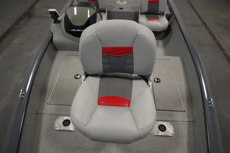 Slide: The Image of 2017 Tracker 20 CW Pontoon boat interior with gray and red seating. - 16