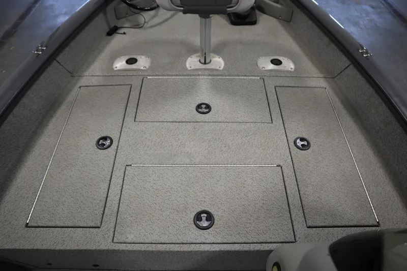 Slide: The Image of 2017 Tracker 20 CW Pontoon boat interior with storage compartments and seating. - 17