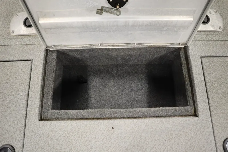 Slide: The Image of Open storage compartment in 2017 Tracker 20 CW Pontoon boat. - 19
