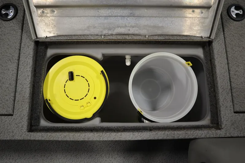 Slide: The Image of 2017 Tracker 20 CW Pontoon storage compartment with yellow and white containers. - 21