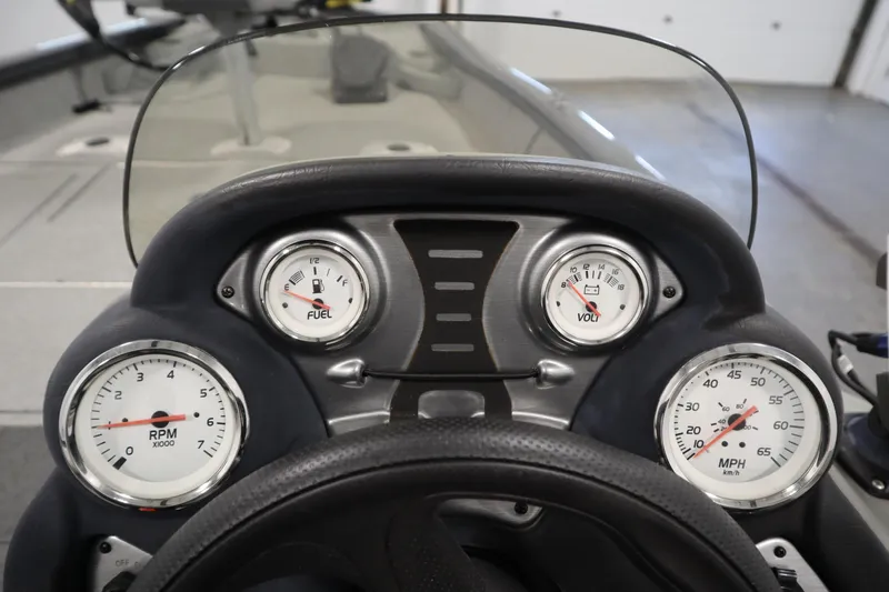 Slide: The Image of 2017 Tracker 20 CW Pontoon dashboard with fuel, volt, RPM, and speed gauges. - 25
