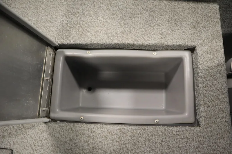 Slide: The Image of Storage compartment on 2017 Tracker 20 CW Pontoon boat, featuring gray interior. - 38