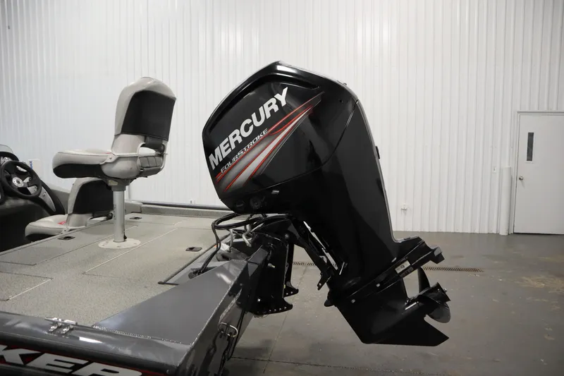 Slide: The Image of 2017 Tracker 20 CW Pontoon with Mercury FourStroke engine in a garage setting. - 43