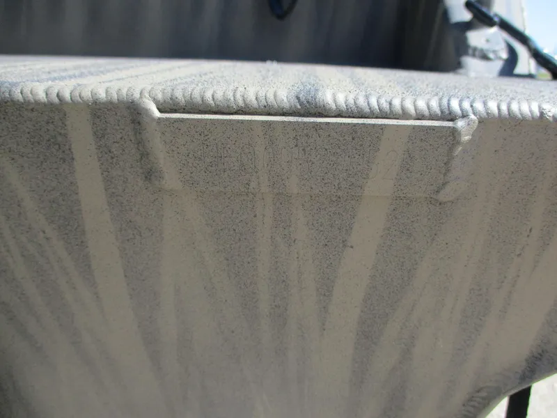 Slide: The Image of Close-up of 2025 Gator Tail 1754 Extreme boat's textured surface and weld detail. - 12