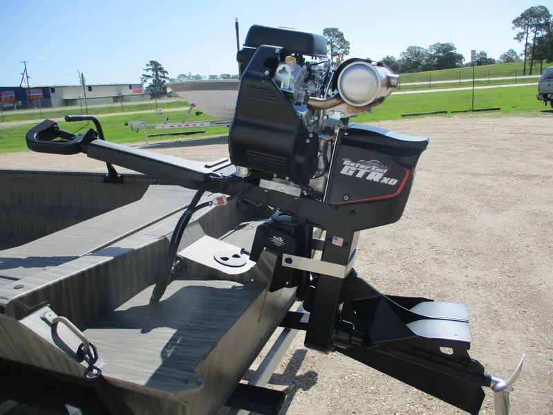 Slide: The Image of 2025 Gator Tail 1754 Extreme boat with powerful outboard motor in a sunny outdoor setting. - 4