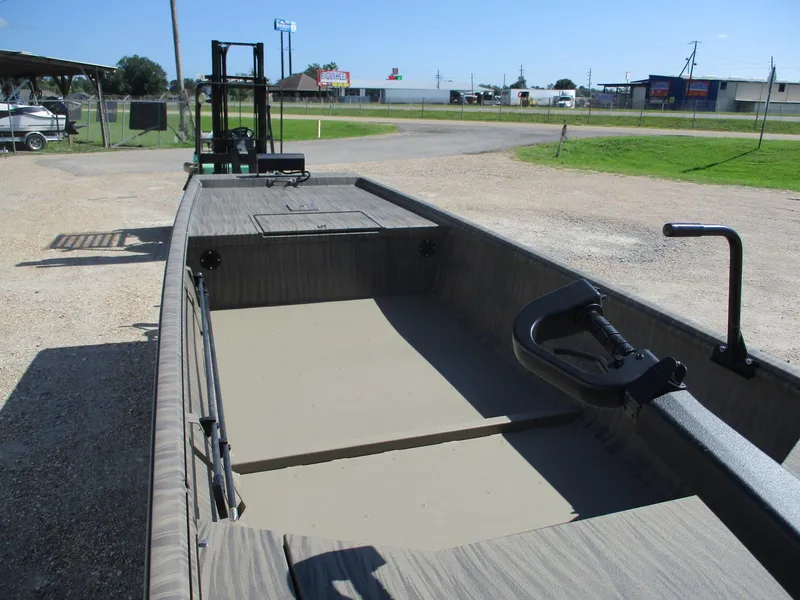 Slide: The Image of 2025 Gator Tail 1754 Extreme boat parked outdoors on gravel. - 8