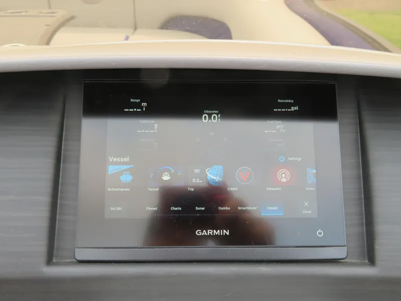 Slide: The Image of Garmin display on 2024 Bennington 25 LTSB boat dashboard showing vessel information. - 22