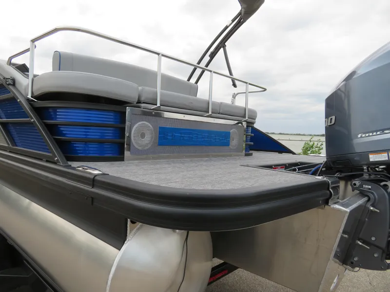 Slide: The Image of 2024 Bennington 25 LTSB pontoon boat with Yamaha outboard motor, featuring sleek design and comfortable seating. - 3