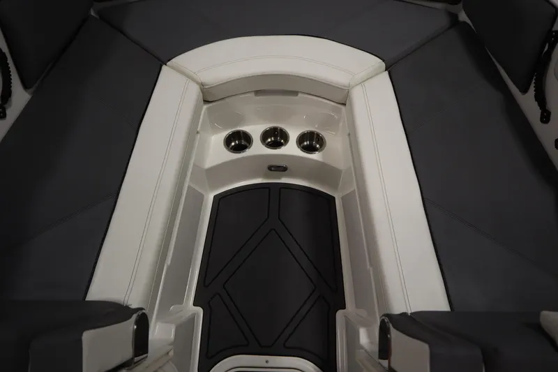 Slide: The Image of 2023 Heyday WT Surf boat interior with cushioned seating and cup holders. - 17