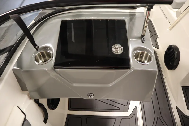 Slide: The Image of 2023 Heyday WT Surf boat interior with cup holders and sleek design. - 31