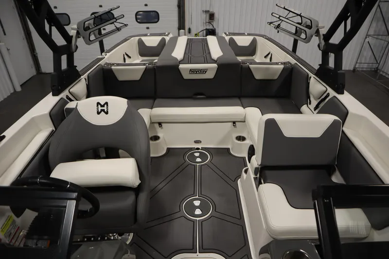 Slide: The Image of 2023 Heyday WT Surf boat interior with modern seating and sleek design. - 32