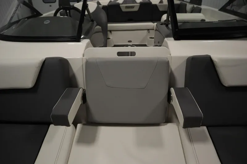 Slide: The Image of 2023 Heyday WT Surf boat interior with gray and white seating. - 12