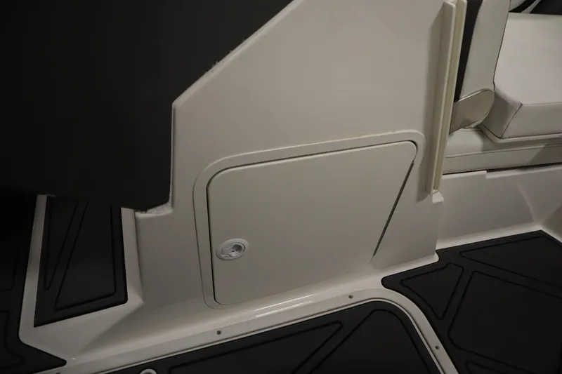 Slide: The Image of 2023 Heyday WT Surf boat interior storage compartment with sleek design and modern finish. - 29
