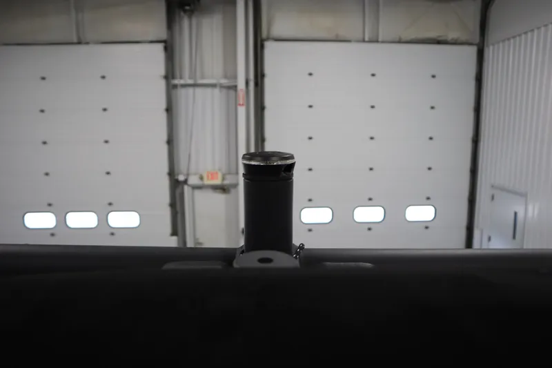 Slide: The Image of 2023 Heyday WT Surf boat detail in a garage with closed doors. - 45