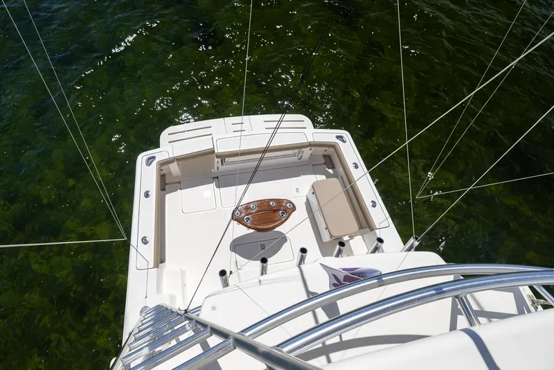 Slide: The Image of Aerial view of 2004 Tiara Yachts 4200 Open on green water. - 20