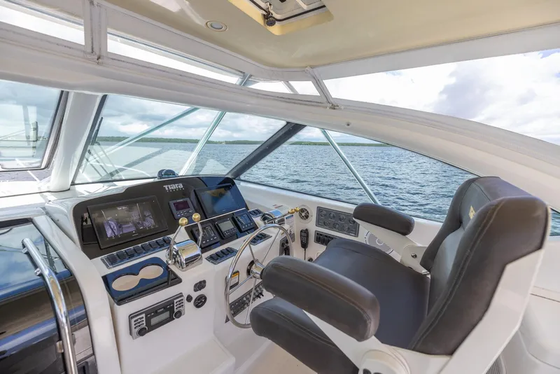 Slide: The Image of Interior view of 2004 Tiara Yachts 4200 Open helm. - 25