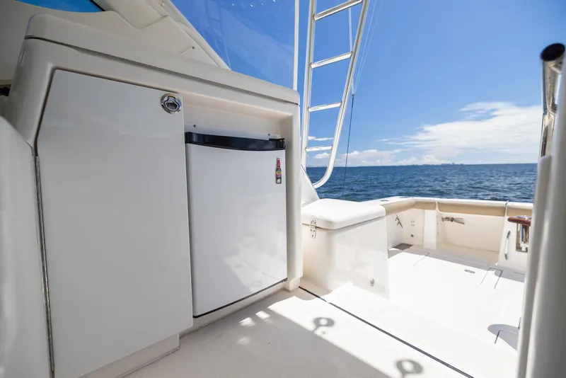 Slide: The Image of 2004 Tiara Yachts 4200 Open, deck view with ocean backdrop. - 28