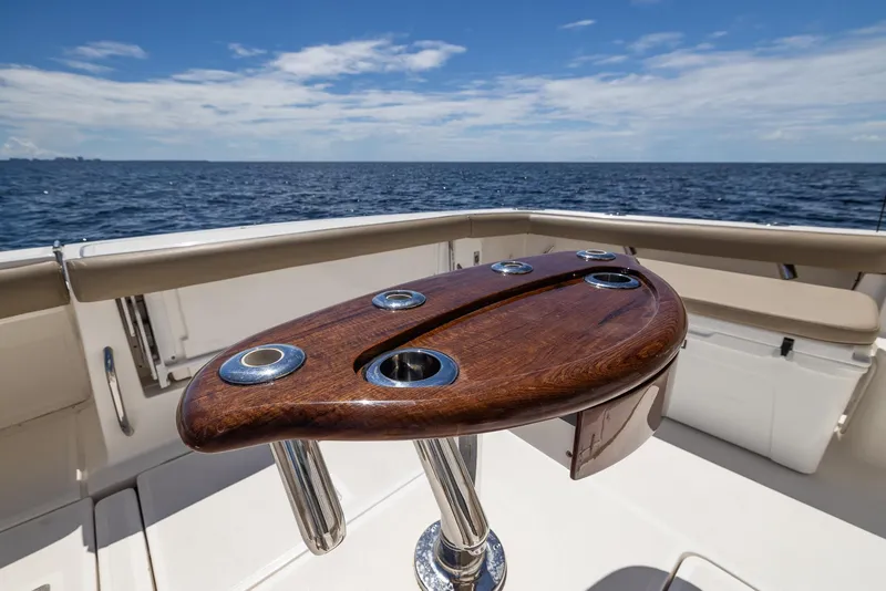 Slide: The Image of Tiara Yachts 4200 Open 2004 with wooden table on open sea. - 30