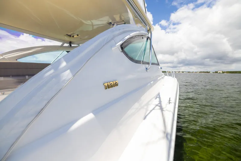 Slide: The Image of 2004 Tiara Yachts 4200 Open on calm water under sunny skies. - 33