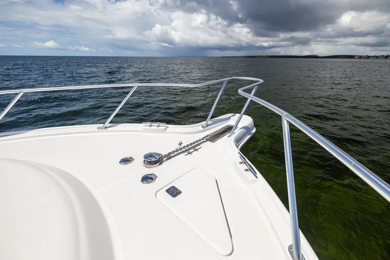 Slide: The Image of Tiara Yachts 4200 Open 2004 on calm sea under cloudy sky. - 35