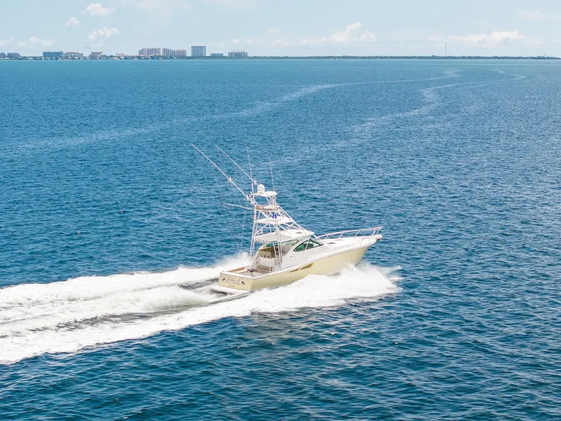 Slide: The Image of 2004 Tiara Yachts 4200 Open cruising on open sea. - 4