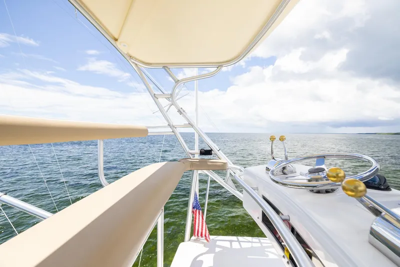 Slide: The Image of Tiara Yachts 4200 Open 2004 on open sea with blue sky. - 41