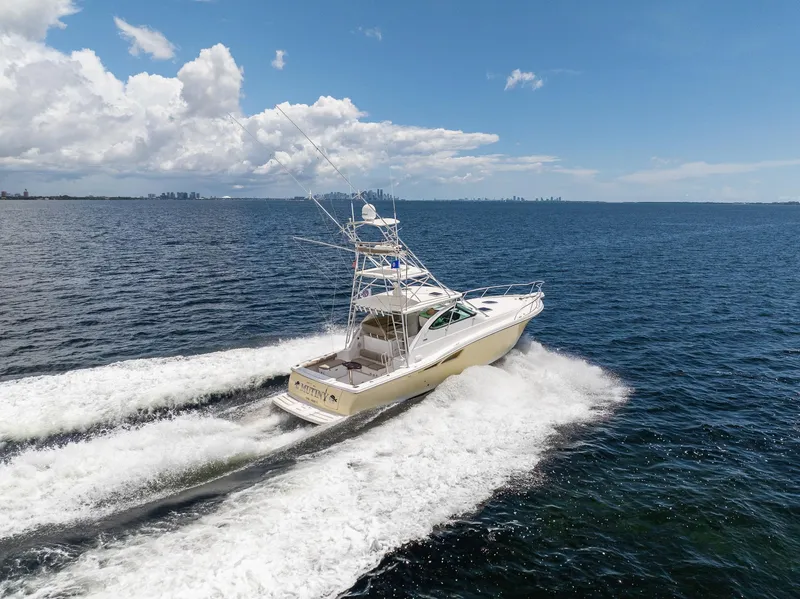 Slide: The Image of 2004 Tiara Yachts 4200 Open cruising on open sea. - 6